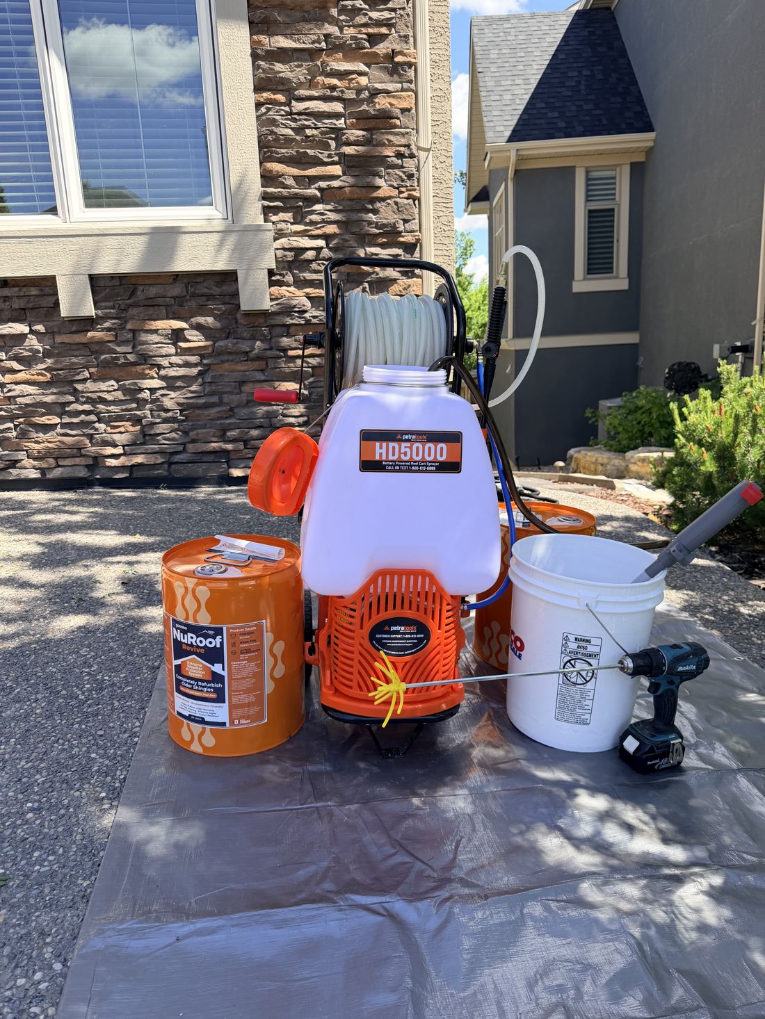 GoNano NuRoof application equipment ready for a Calgary roof