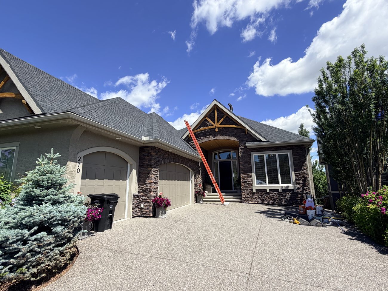 Nano Shield Calgary crew treating a roof on a Calgary home