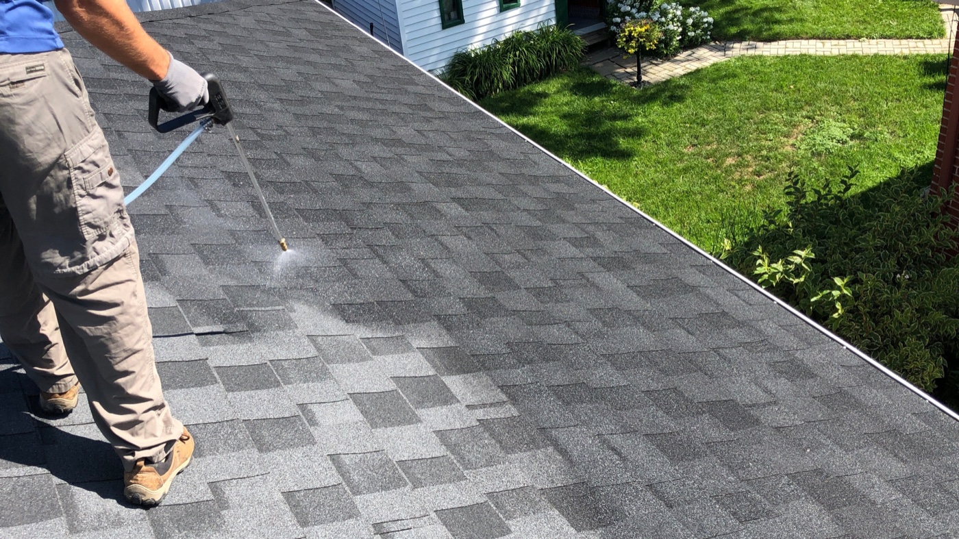 GoNano NuRoof being sprayed onto a Calgary roof